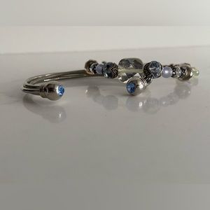 Blue and Silvertone Costume Bracelts. The beaded bracelet is by Desert Heart.